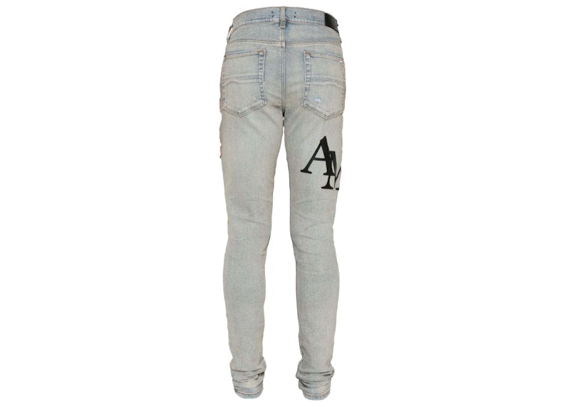 AMIRI Staggered Logo Skinny Jean Antique Indigo Black