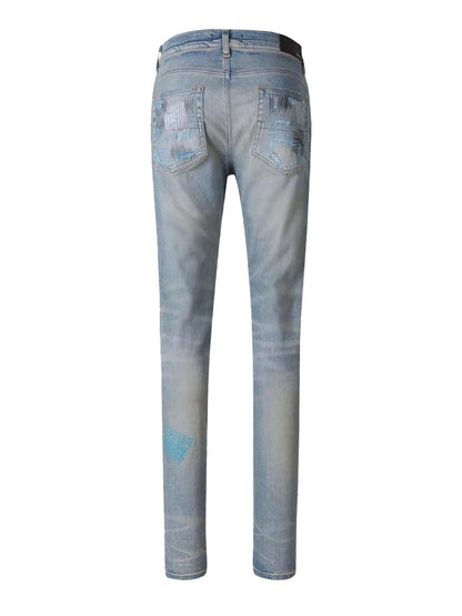 AMIRI Distressed Mid-Rise Jeans Blue