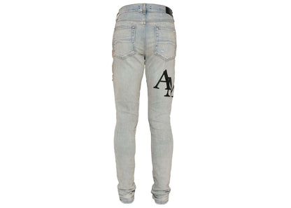 AMIRI Staggered Logo Skinny Jean Antique Indigo Black
