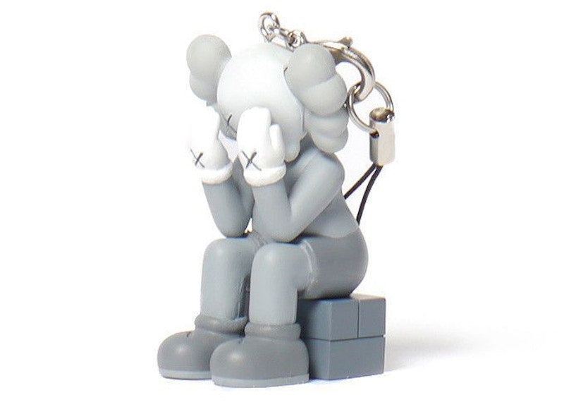 KAWS Passing Through Keychain Grey
