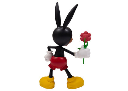 Rello Ozzy Picking Daisies Statue