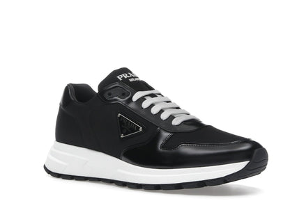 Prada PRAX 01 Sneakers Re-Nylon Brushed Leather Black White