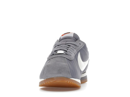 Nike Cortez Textile Cement Grey Gum Light Brown Safety Orange Sail (Women's)