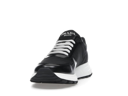 Prada PRAX 01 Sneakers Re-Nylon Brushed Leather Black White