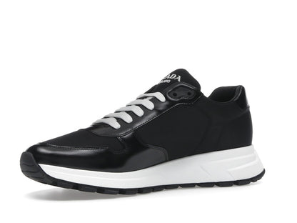 Prada PRAX 01 Sneakers Re-Nylon Brushed Leather Black White