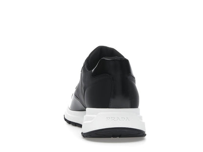 Prada PRAX 01 Sneakers Re-Nylon Brushed Leather Black White