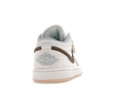 Jordan 1 Low Coral (Women's)