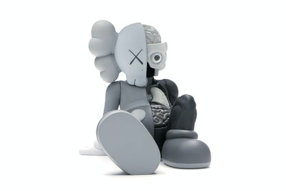 KAWS Resting Place Vinyl Figure Grey