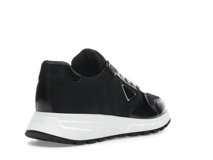 Prada PRAX 01 Sneakers Re-Nylon Brushed Leather Black White