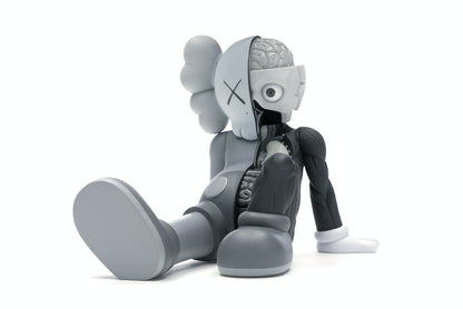 KAWS Resting Place Vinyl Figure Grey